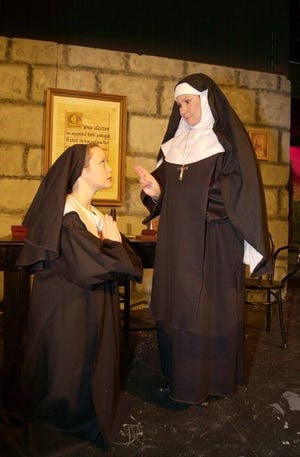 Joan Foster McKeown, right, plays the Mother Abbess in the Spartanburg Little Theatre's production of "The Sound of Music." Regina Davis plays Maria. Years ago, McKeown played the role of Maria in Spartanburg.