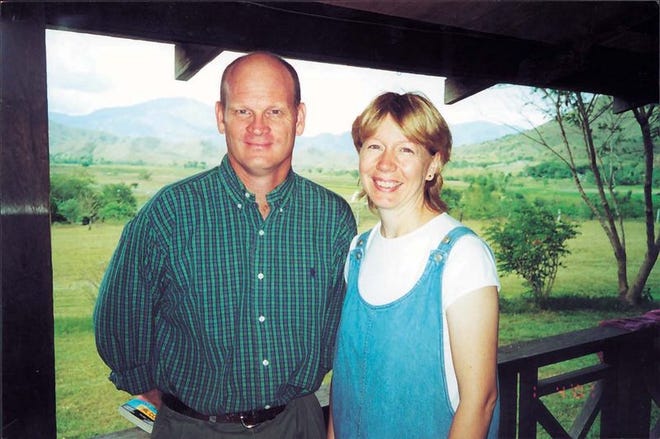 The late Martin Burnham and his wife, Gracia, are shown on their porch in Aritao in the Philippines, where they served as missionaries for 16 years.