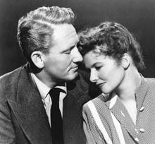 Katharine Hepburn, shown with Spencer Tracy, in the 1945 film "Without Love," won a record four Oscars.