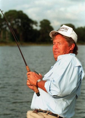 Fisherman Jimmy Rogers works the shore of Lake Cannon. Rogers was the host of the "Jimmy Rogers Fishing Adventures" television show.