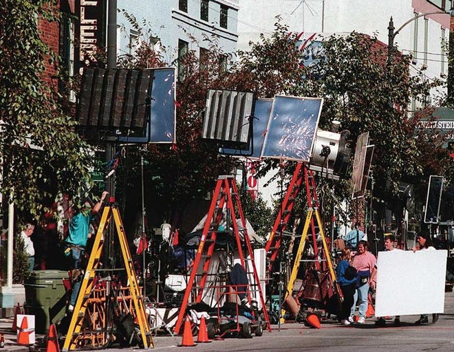 Front Street in Wilmington, N.C., is lined with technicians and lighting equipment as filming for a movie takes place in this 1994 photo.