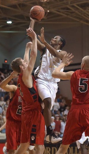 Wofford's Byron Fields goes up for a basket against Davidson on Saturday at Wofford.