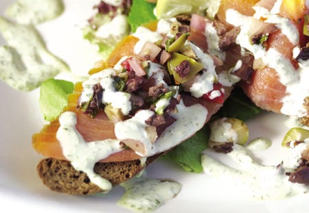 This tapas features smoked salmon with an olive tapenade over bread.
Knight Ridder Tribune photo