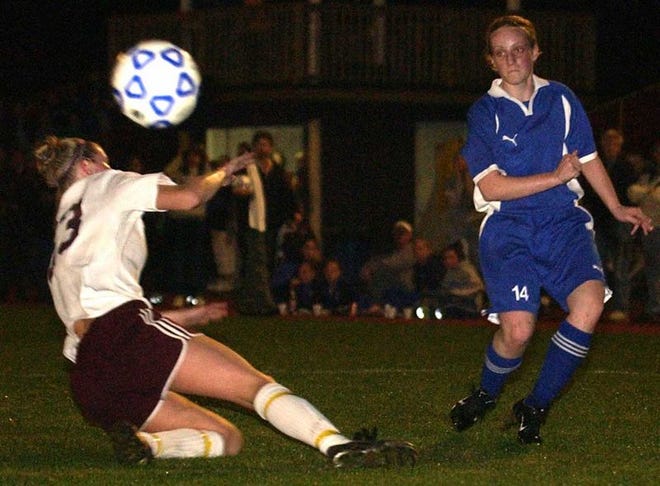 Oak Hall's Lindsay Schaefer attempts to stop a pass by P.K. Yonge's Erin Armstrong during Tuesday's state playoff game.