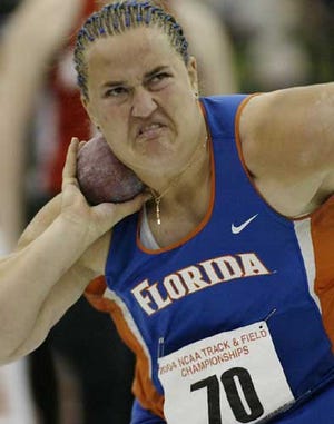 Florida's Karen Freberg grimaces as she throws the shot at the NCAA Division I Indoor Track and Field Championships in Fayetteville, Ark., Saturday. Freberg finished sixth in the competition with a throw of 55 feet 5 1/2 inches.