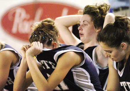 Exeter High School's Amanda Swiezynski shows her disappointment during the late stages of the Blue Hawks' 54-41 loss to Nashua in Saturday's Class L title game.