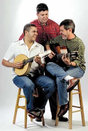 From left, Hamilton de Holanda, on the bandolim mandolin; Welson Tremura, a UF assistant professor in the Center for Latin American Studies; and Marco Pereira on guitar.