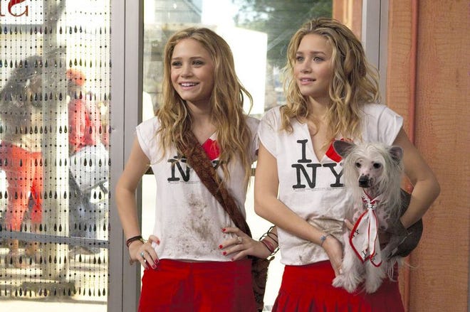 Mary-Kate and Ashley Olsen star in the action comedy "New York Minute." The twins starred as infants in the TV series "Full House." A review of the movie is on Page 15.