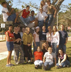 Yearbook staffers now have time to "hang out" on the Santa Fe High School campus. They include, in tree from left, Cory Vejraska, Nichole Auffenburg, Michael Ross, Gio Palmi, Brittany Hirsch and Jenny Price, from middle left, Janay McCray, Sherra McCrae, Isla Greenwald, Caitlin Shafnacker, adviser Pam Doody, Alyson Yates, Carla Hooser, Taylor Herring, Jennifer Talley and Thomas Bartlett, and seated, Kylie Emerson, Danni Harvey, Megan Holloway and Ginesta Vilardell.