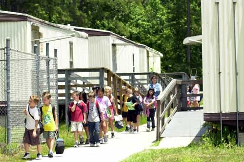 Wiles Elementary students crowd the front hall after school on Thursday.