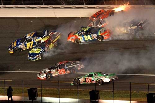 Kurt Busch (97), Kasey Kahne (16), Jeff Gordon (24), Sterling Marlin (40), Joe Nemechek (01) and Kevin Harvick (29) slide and crash at Lowe's Motor Speedway on Saturday evening, during the NASCAR Nextel All-Star Challenge in Concord, N.C.