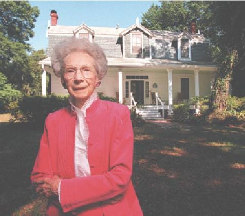 Sarah Matheson stands in front of her family home, now part of the Matheson Museum complex.