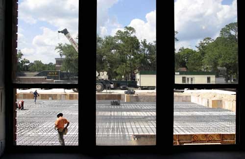 The University of Florida's Library West undergoes construction May 20 as construction workers lay the steel reinforcement for the library's extension. As work continues, some people who would normally turn to the library for books appear to be using the Internet instead.