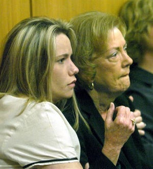 MICHAEL WILSON/The Ledger
Angel Nations, left, daughter of fatal beating victim Lorraine Rash, and Rash's mother, Sue Sykes, listen as the judge speaks during the sentencing of Tony Ray Wilson on Friday in Bartow.