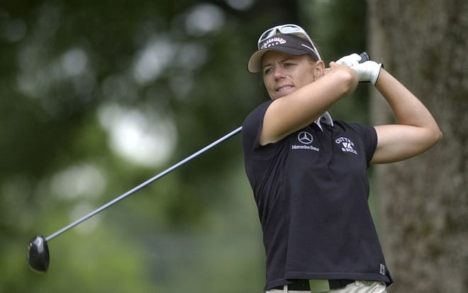 Annika Sorenstam drives the ball Sunday during the LPGA Championship. She recovered from mid-round trouble to win.