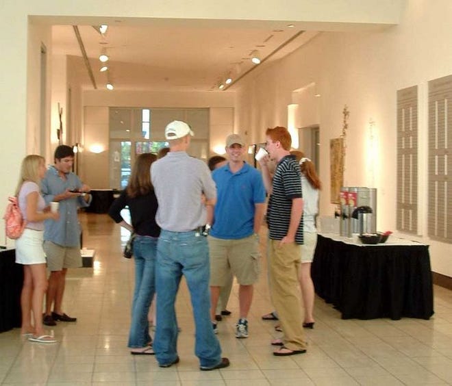 People gather at the Samuel P. Harn Museum of Art at the opening reception for "Museum Nights," on Thursday.