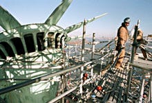 Workers remove scaffolding from the Statue of Liberty on Dec. 17, 1985, during a top-to-bottom renovation.