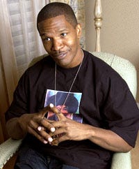 Jamie Foxx was posing for a portrait at the Beverly Hills Hotel when Tom Cruise, his "Collateral" co-star, borrowed the camera and took a few shots.