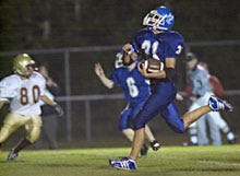Mashpee running back Corey Amaral sprints toward the end zone on his way to a second quarter, 10-yard touchdown run against Cape Tech/Harwich last night. It was the only touchdown of the night in Mashpee's 10-0 triumph.