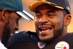 GENE J. PUSKAR/The Associated Press
Pittsburgh's Jerome Bettis had plenty to smile about with Philadelphia's Donovan McNabb yesterday at Heinz Field. Taking the place of Duce Staley, Bettis ran for 149 yards in the win.
