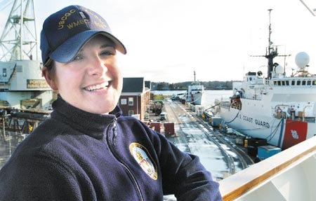 Lt. Junior Grade Staci Krueger, a combat information center Officer and Law Enforcement Officer, stands on the bridge of Coast Guard Cutter Tahoma on Friday afternoon after returning back to the Portsmouth Naval Shipyard following a lenghty detail at sea.