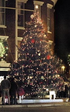 The Christmas tree in Portsmouth's Market Square stands aglow minutes after the annual Christmas tree lighting ceremony on Friday evening.