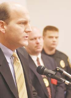 Assistant U.S. Attorney Mark Howard announces the recent seizure of more than 400 pounds of marijuana in a news conference attended by Farmington Police Chief Scott Roberge, center, and Sgt. Myron Crossley. AP photo