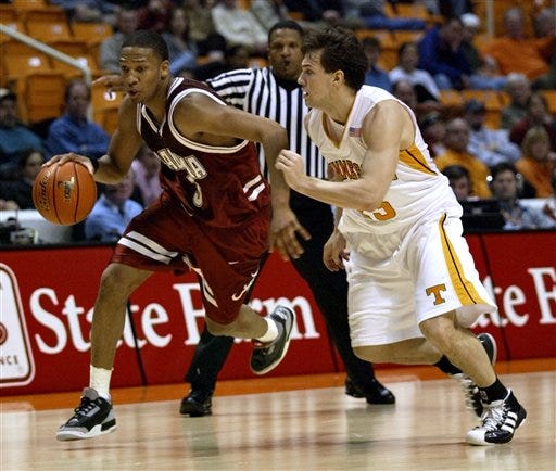 Alabama's Kennedy Winston (3) drives against Tennessee's Dane Bradshaw (23) during the second half Wednesday in Knoxville, Tenn. Winston scored 18 points to lead his team to a 72-54 win.