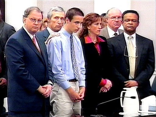 Defendant Christopher Pittman, center, listens as the guilty verdict is read in the courtroom in Charleston, S.C. Tuesday, after about six hours of deliberations. The 15-year-old who claimed the antidepressant drug Zoloft drove him to kill his grandparents was found guilty of murder. He was later sentenced to 30 years in prison.