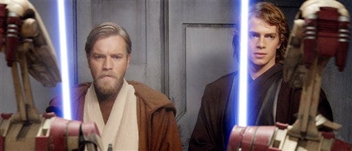 This undated promotional photo provided by Twentieth Century Fox shows actors Ewan McGregor, left, as Obi-Wan Kenobi and Hayden Christensen as Anakin Skywalker in a scene from Lucasfilm's "Star Wars: Episode III Revenge of the Sith."