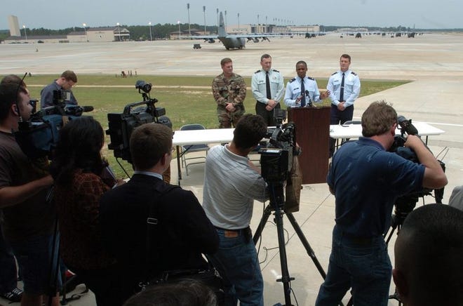 Army and Air Force officers face reporters about the future of Pope Air Force Base, N.C., Friday. From left are: Army Special Operations Command spokesman Maj. Robert Gowan; Fort Bragg Garrison Commander Col. Al Aycock; 43rd Airlift Wing Commander Col. Darren McDew and 23rd Fighter Group Commander Col. Warren Henderson.