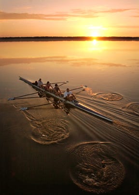 Rowers at sunrise on Newnan's Lake