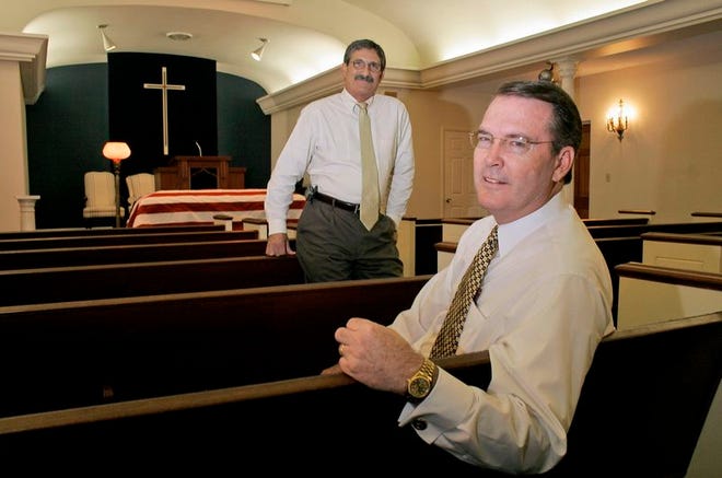 Rick Gandy, former owner of Dukes-Steen Funeral Home, joins Lew Hall Jr., funeral director and owner of Gentry-Morrison Funeral Homes, at Gentry-Morrison's Southside Chapel in Lakeland.