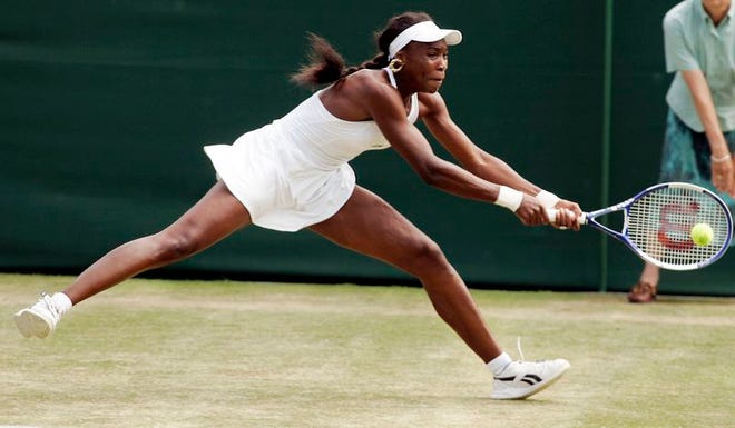 Venus Williams extends herself to hit a return to Jill Craybas during their match in the Round of 16 at Wimbledon on Monday. Williams easily defeated Craybas and will play Mary Pierce in the quarterfinals today.