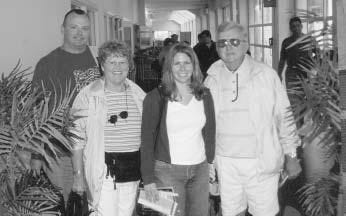 GOLDEN CRUISE: Dave and Janet Carey, who reside in in Homosassa, Fla.,pause with their son and daughter-in-law, Christopher and Catherine Carey ofRutland, as they board the “Dawn Princess” liner for a cruise to Alaska. Thetrip was a 50th wedding anniversary present from the Rutland Careys.