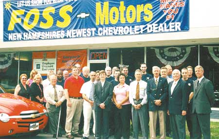The staff of Foss Motors Chevrolet stands in front of the new dealership.
	Courtesy photo