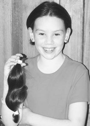Colleen Mulry donated her hair to Locks of Love recently. According to her mother, Colleen had been growing her hair with the intent of donating it for about a year. Her decision came after her father was diagnosed with cancer and lost his hair during chemotherapy.