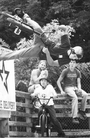 Eastern Boarder exhibition bicyclists defy gravity at the Rutland Skate Park last Saturday. Joyce Roberts photo