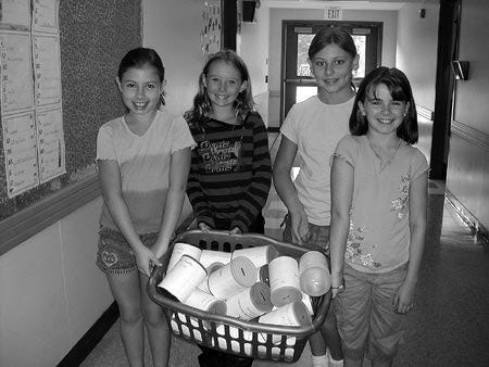 Alissa Bredbenner, Alexandra Sheprd, Shailyn Ireland and Autumn Fournier prepare to pass out collection cans to each classroom at Danville Elementary School to benefit Hurricane Katrina victims.
Christine Dube photo