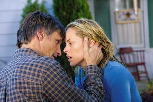 Viggo Mortenson and Maria Bello star as a husband and wife thrown into a world of brutality in "A History of Violence."
