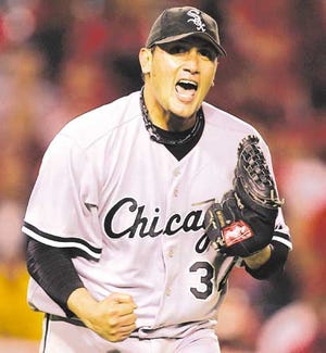 White Sox starting pitcher Freddy Garcia celebrates his complete-game victory over the Angels in Game 4 of the American League Championship Series on Saturday.