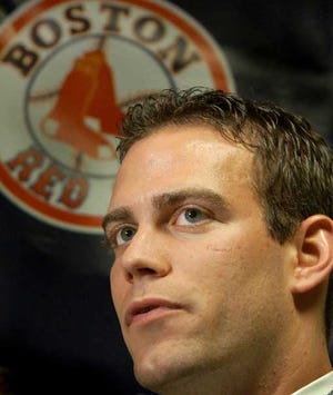 Boston Red Sox general manager Theo Epstein resigned Monday, a stunning move that surprised the baseball world one year after he helped build Boston's first World Series championship team since 1918.