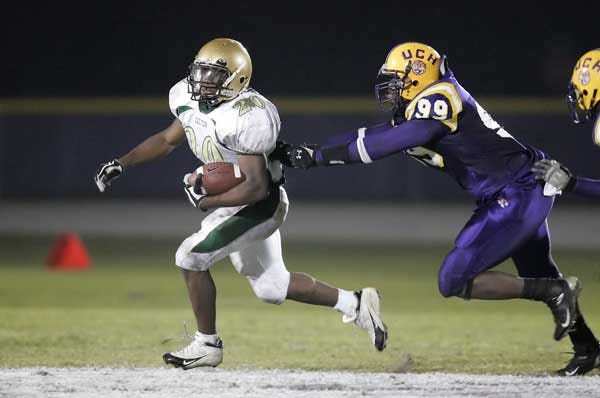 Trinity Catholic's running back Rudell Small gains yardage in the Celtic's earlier meeting with Union County.