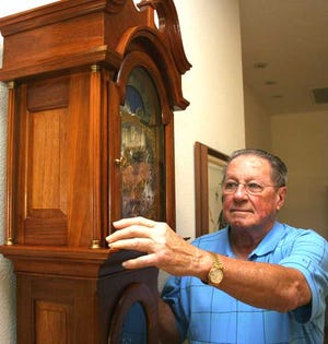 Ward Browning explains the process of completing a handmade grandfather clock.