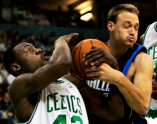 Dallas' Keith Van Horn, right, fights Boston's Tony Allen for a rebound in the first half.