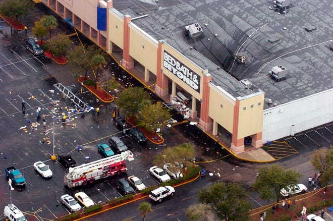 Heavy rains caved in the roof of a Bed Bath & Beyond store on Friday in St. Petersburg.