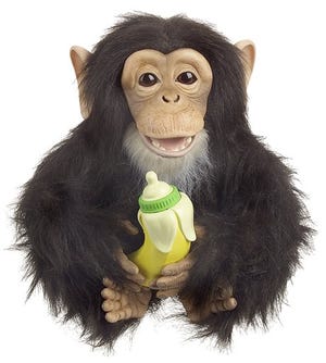 Robotic toys, like Hasbro's Cuddle Chimp, show how the industry has made strides in evolving into an entertainment business with lifelike playmates.