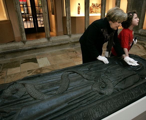 AP photo
Brook Cottrell, 9, feels a 500-year-old Spanish tomb cover with the assistance of docent Carolyn Reintjes during a tour for blind persons at the Nelson-Atkins Museum of Art in Kansas City, Mo.
