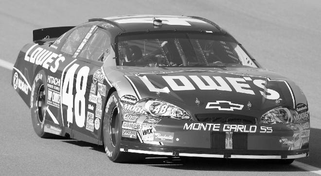 Jimmie Johnson drives his car during practice for Sunday's NASCAR Nextel Cup Auto Club 500 at the California Speedway in Fontana, Calif. on Saturday, Feb. 25, 2006.
