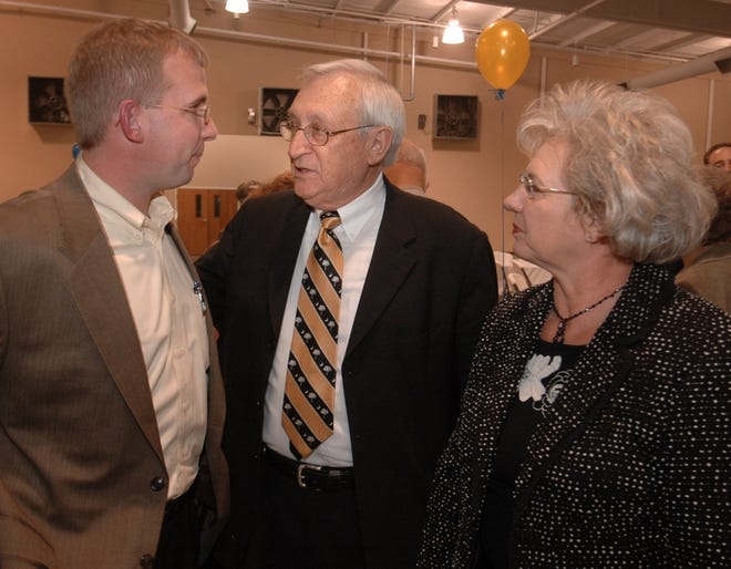 Gaffney Mayor Henry Jolly, center, Brad Wilkins, left, and his mother, Jane Wilkins, right, chat after the Cherokee County Chamber of Commerce's 2006 annual meeting, held at the Broad River Cooperative in Gaffney Thursday evening. Mayor Jolly and Wilkins' husband, the late Don Lewis Wilkins, were honored, along with the late Gene Brown, during a Hall of Fame awards

recognition during the Chamber meeting.